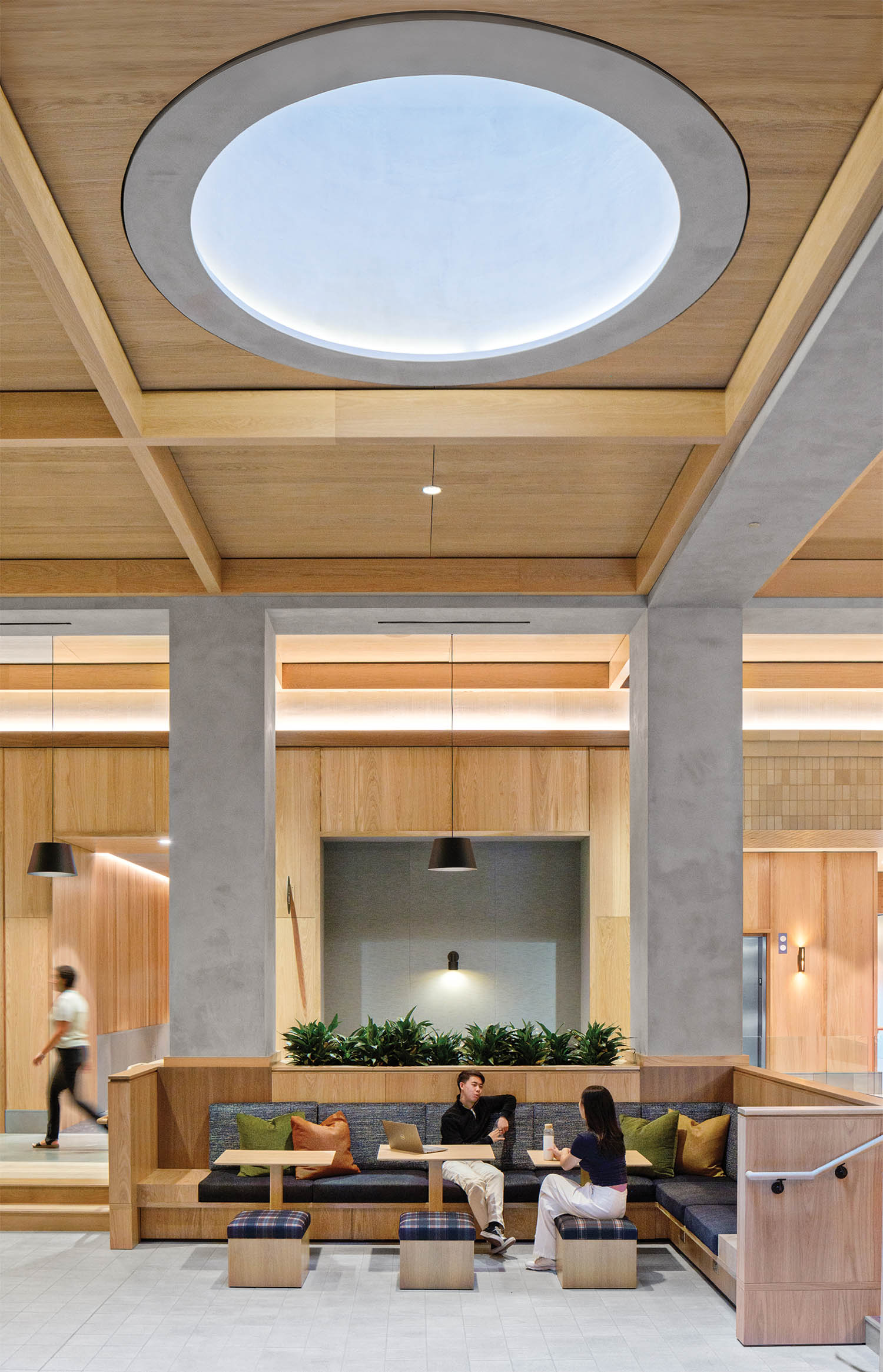 lounge area with circular skylight