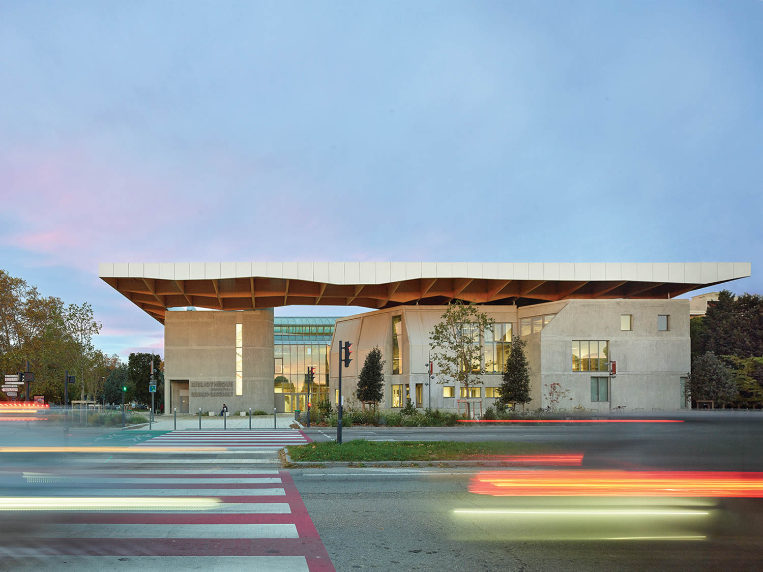 exterior facade of library with a curved roof