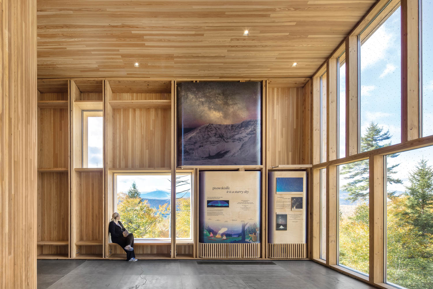 museum displays showcasing images and photographs about the Wabanaki people