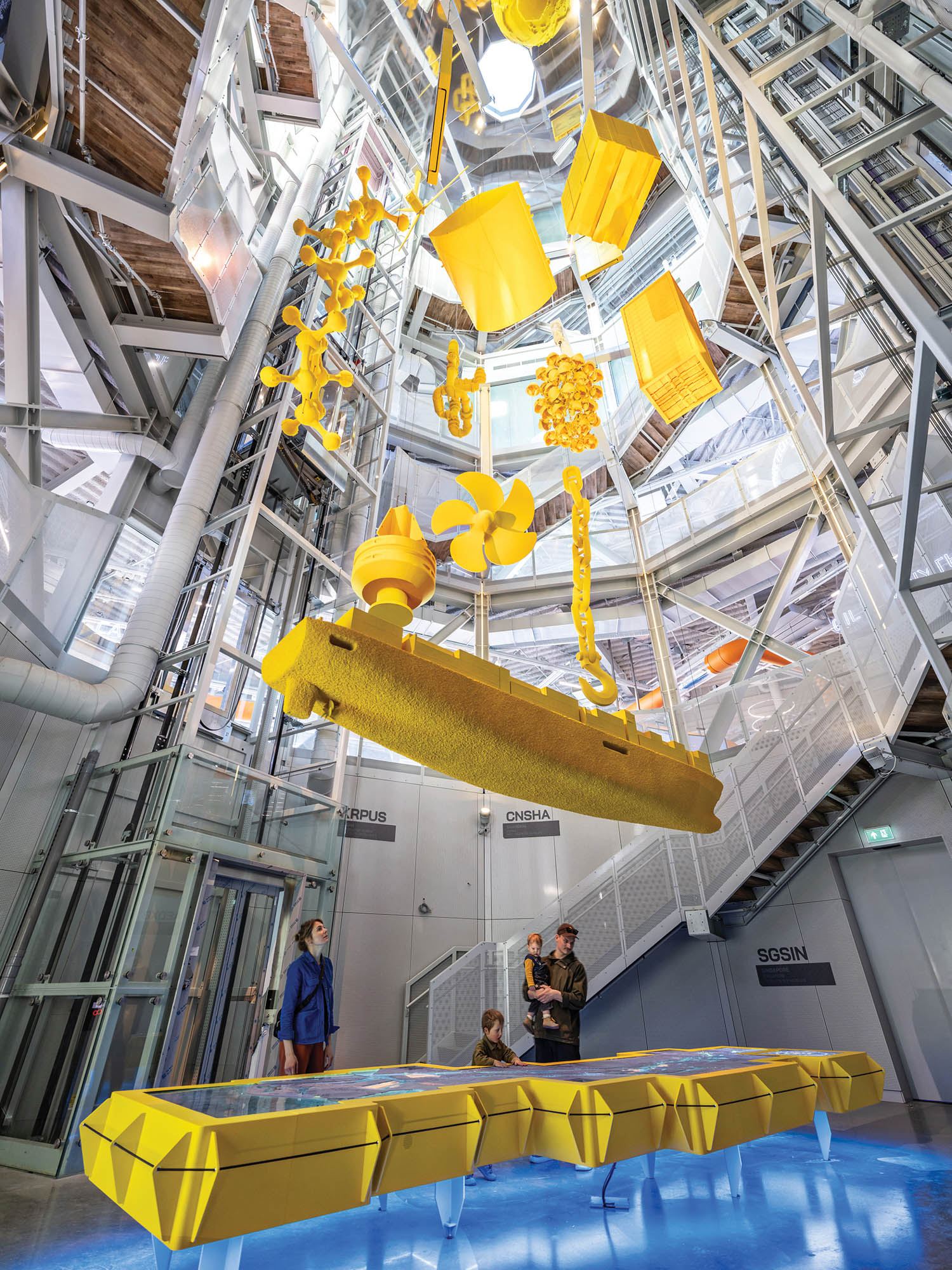 an all yellow play structure for kids to learn from