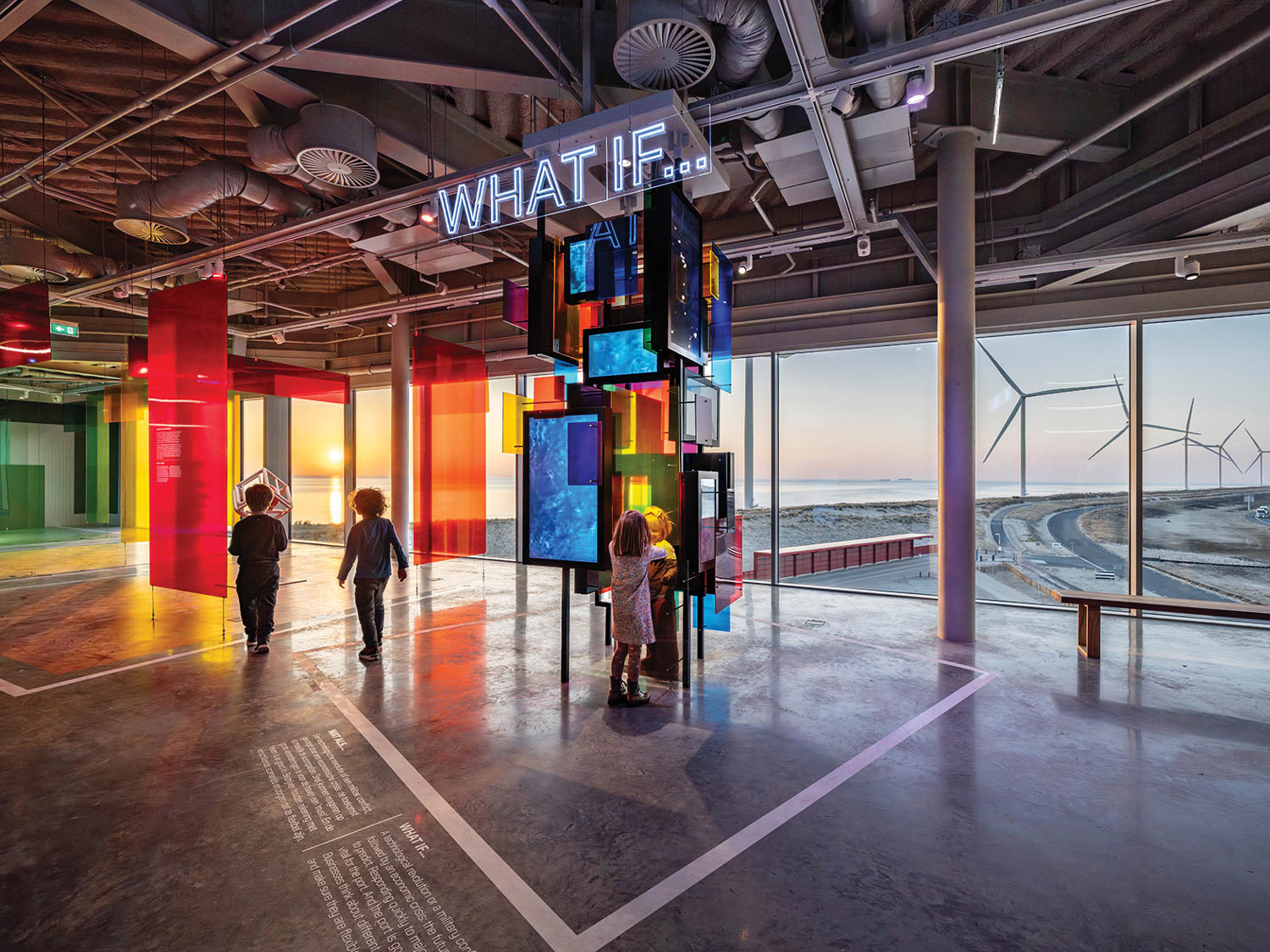 structure with multiple tv screens inside a building