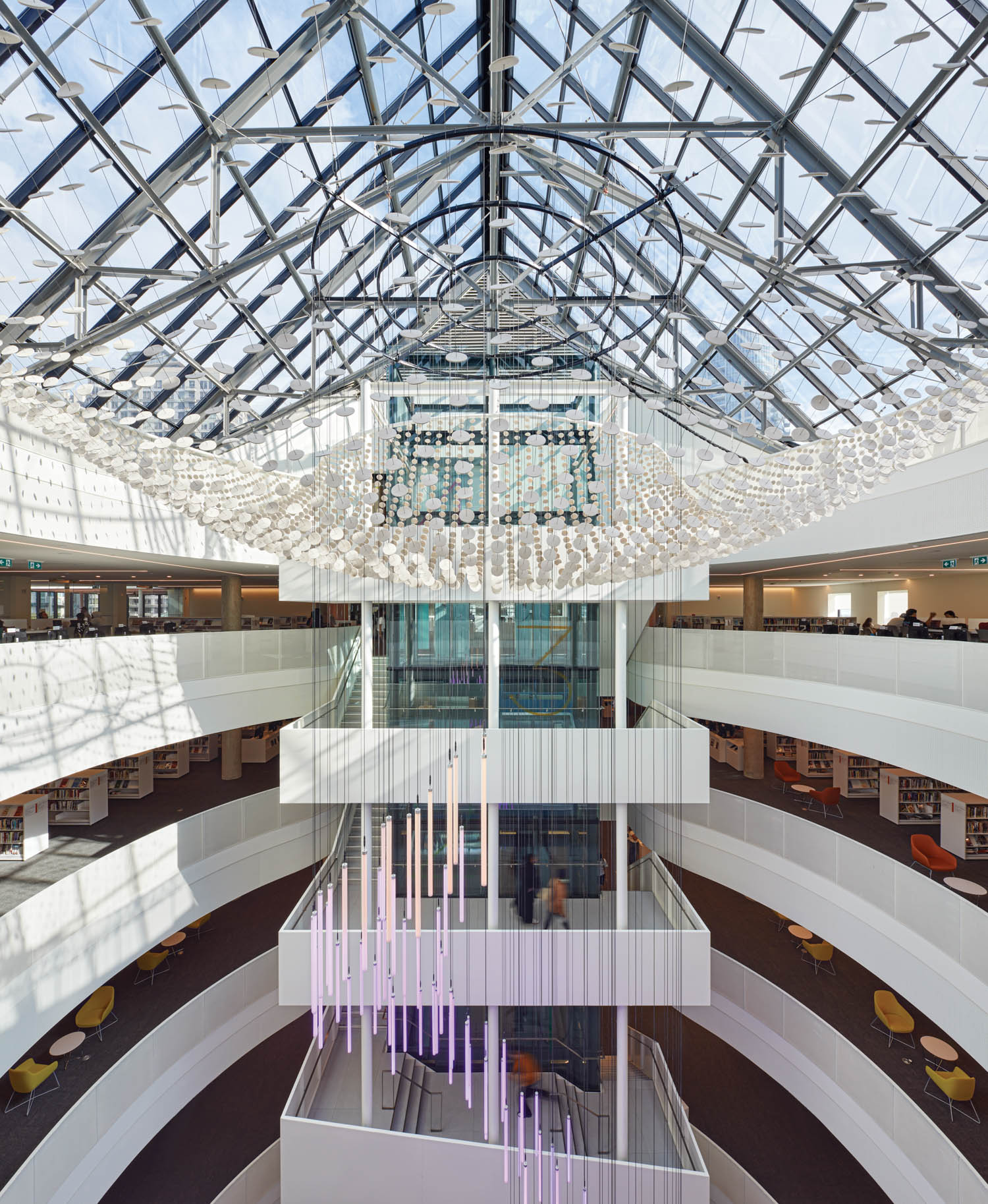 multiple floor building with intricate circular installation