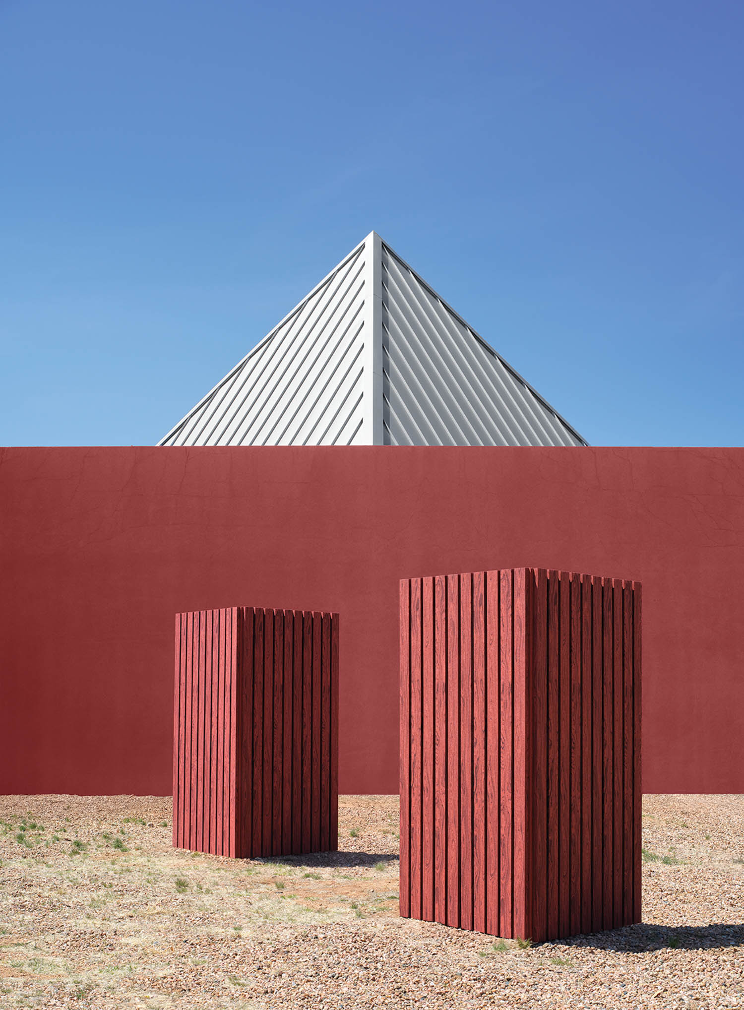 red rectangular structures in front of wall