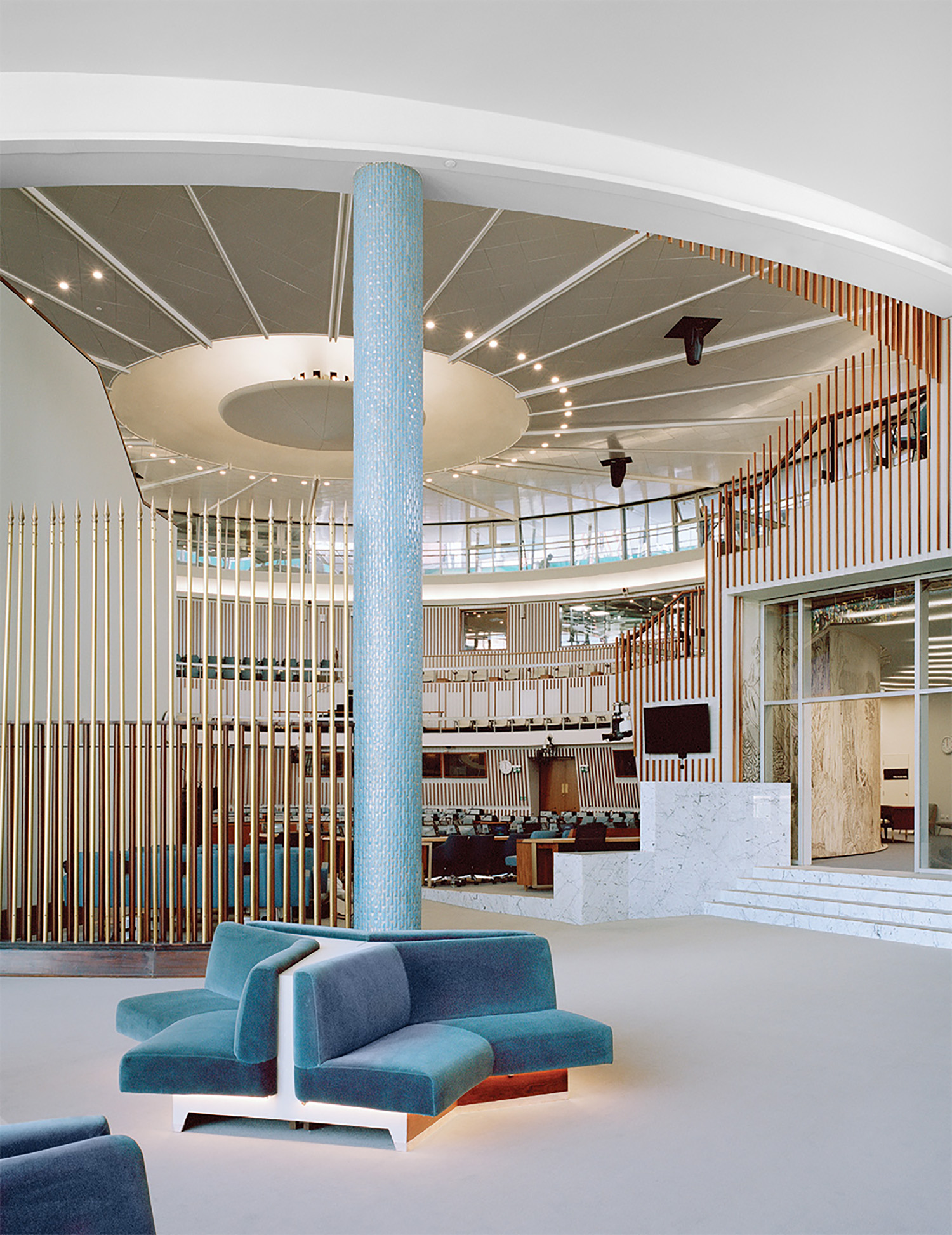 A large room with a large circular ceiling.