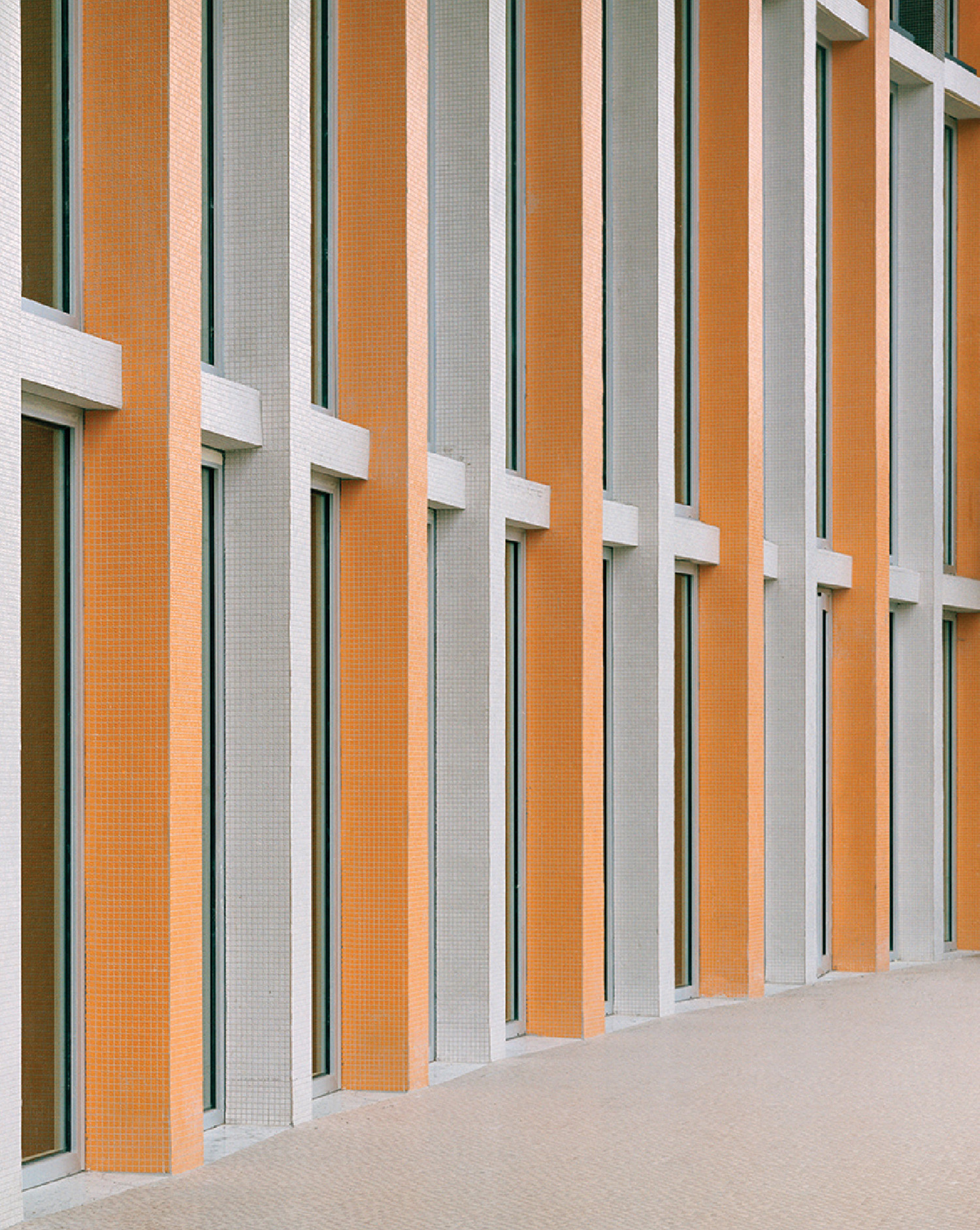 Side columns with orange white stripes walls.