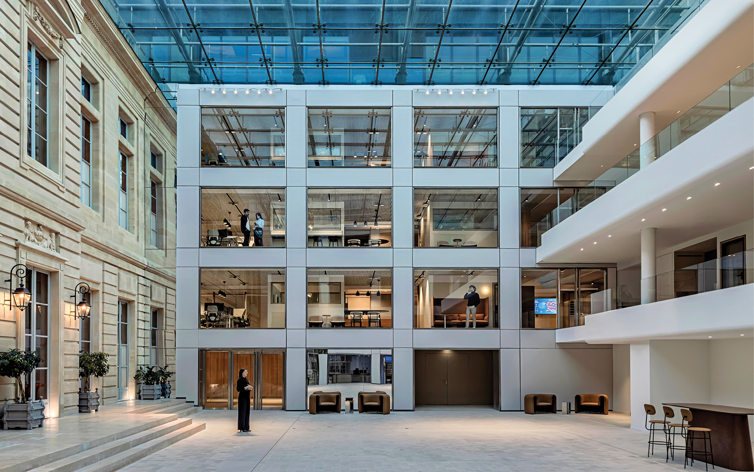 A large atrium with a glass ceiling.