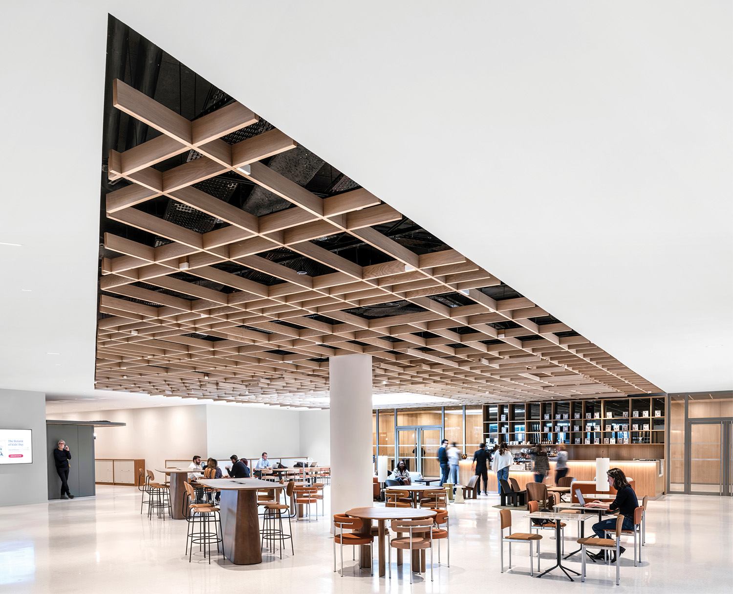 A large open space with a long table and chairs.