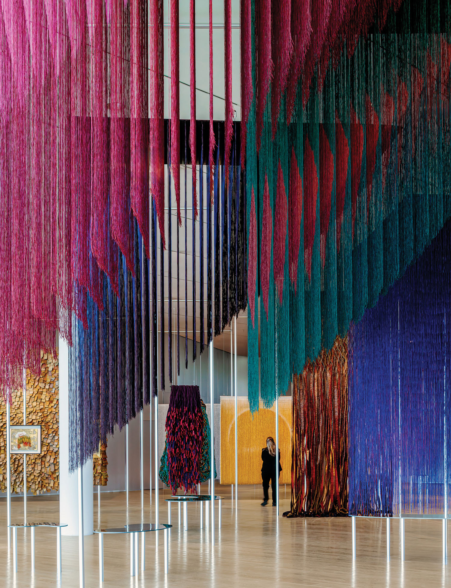 A large room with a large colorful sculpture.