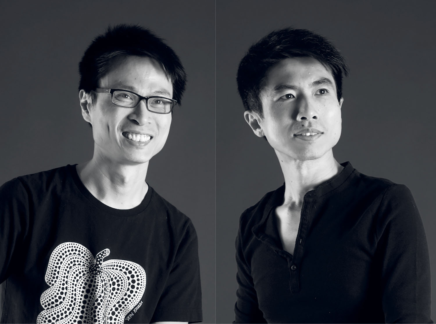 Two men with glasses and a black shirt