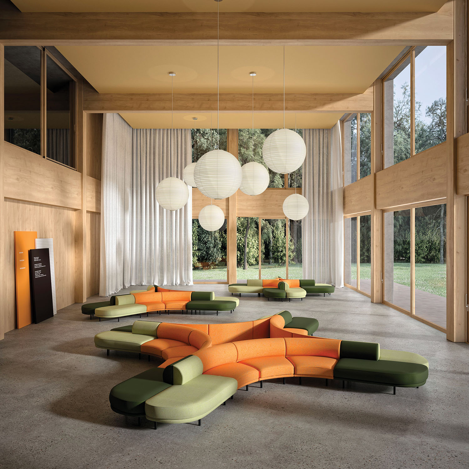 A living room with a large couch and a large table.