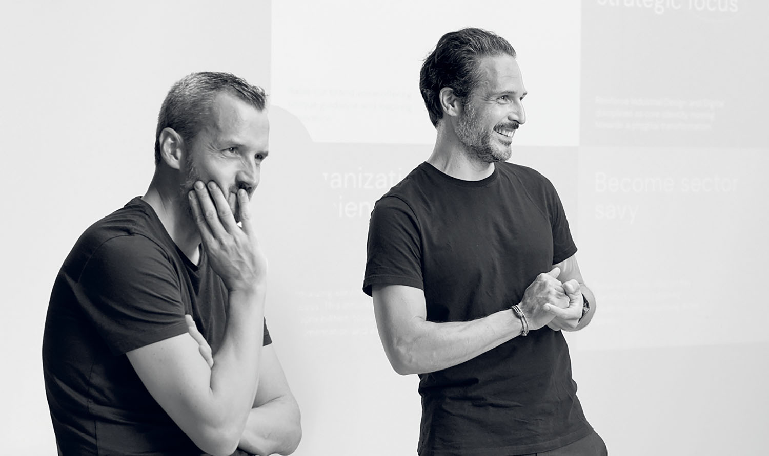 Two men standing next to each other