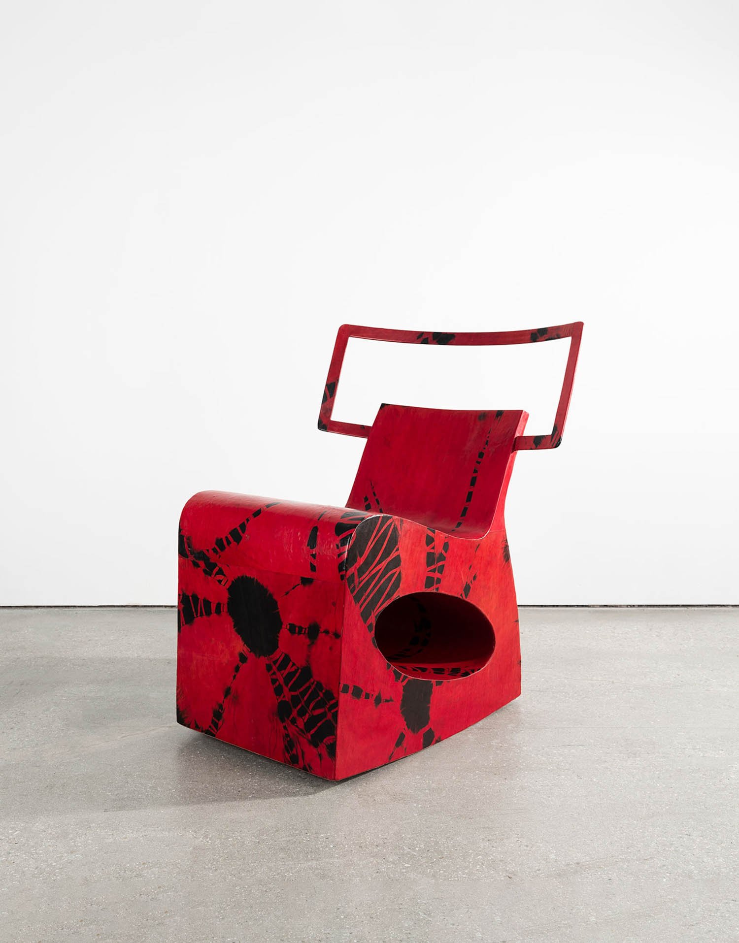 speckled red chair with handle