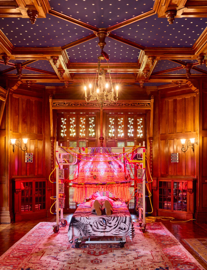an orange and pink room in the newport museum of art