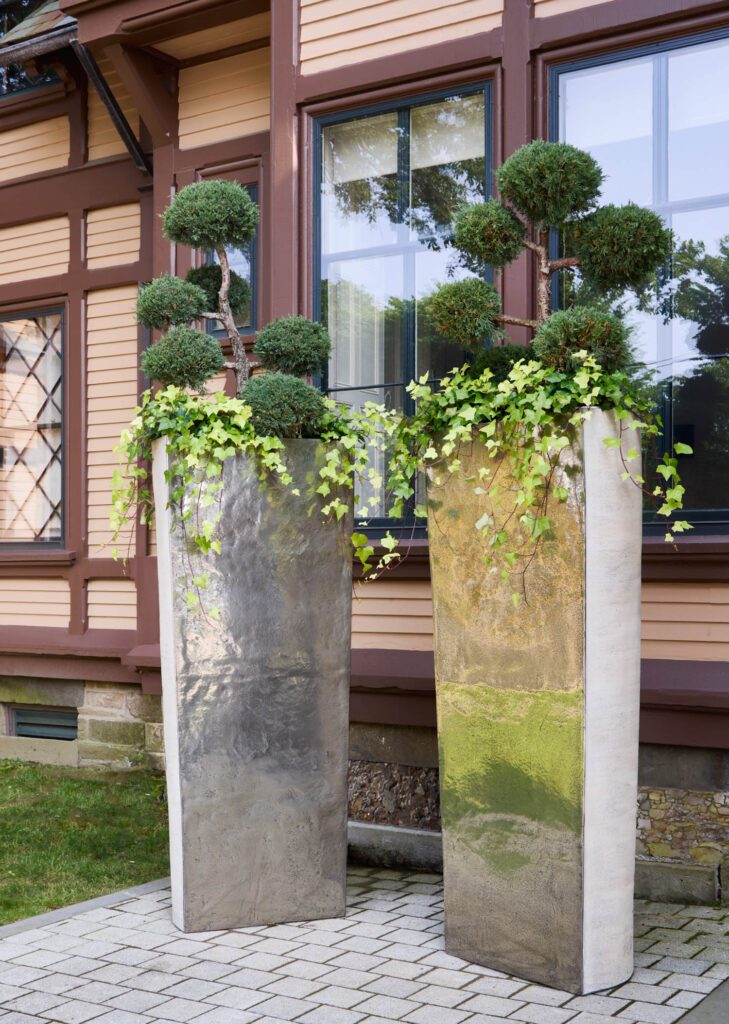 two reflective planters designed by lauren rottet