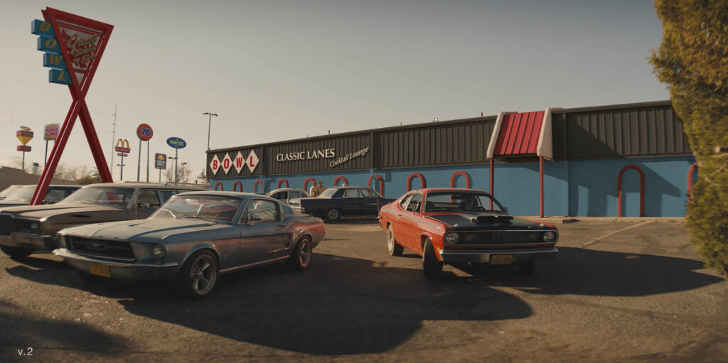 exterior of bowling alley with vintage cars