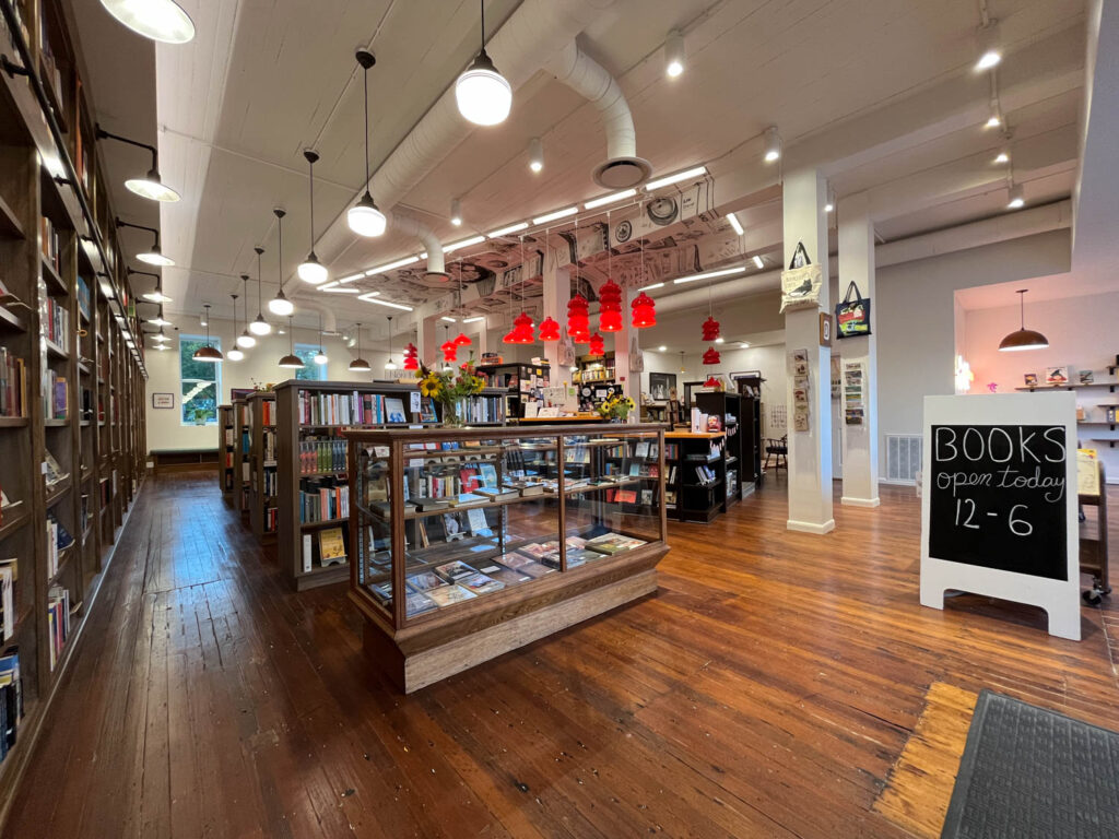 bookstore interior with multiple lights and wooden floors