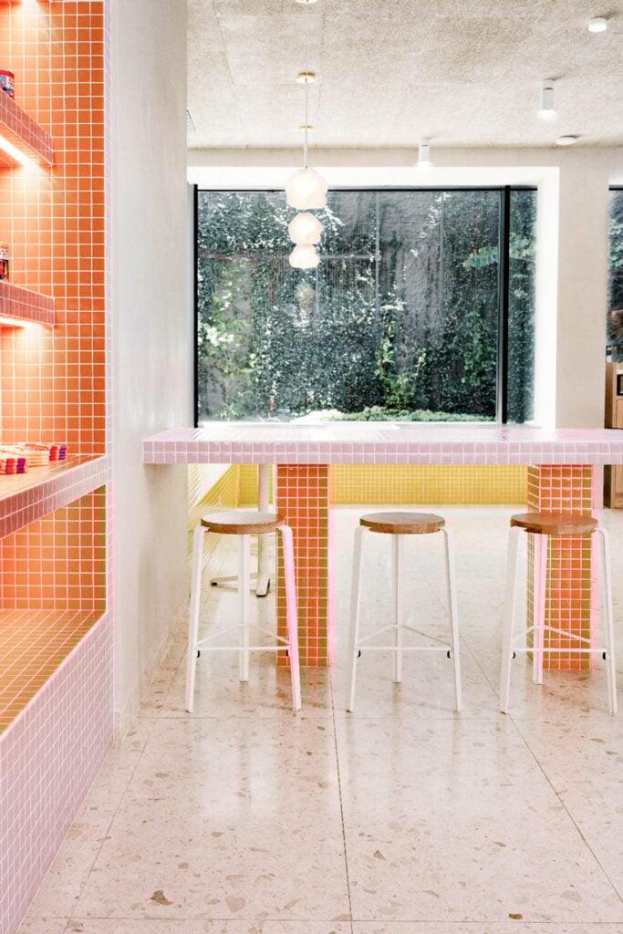 corner of shop with tile tables and seating