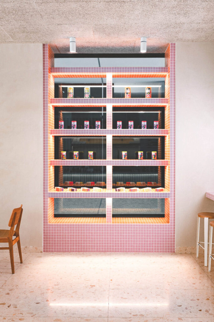 pink tile shelf with items