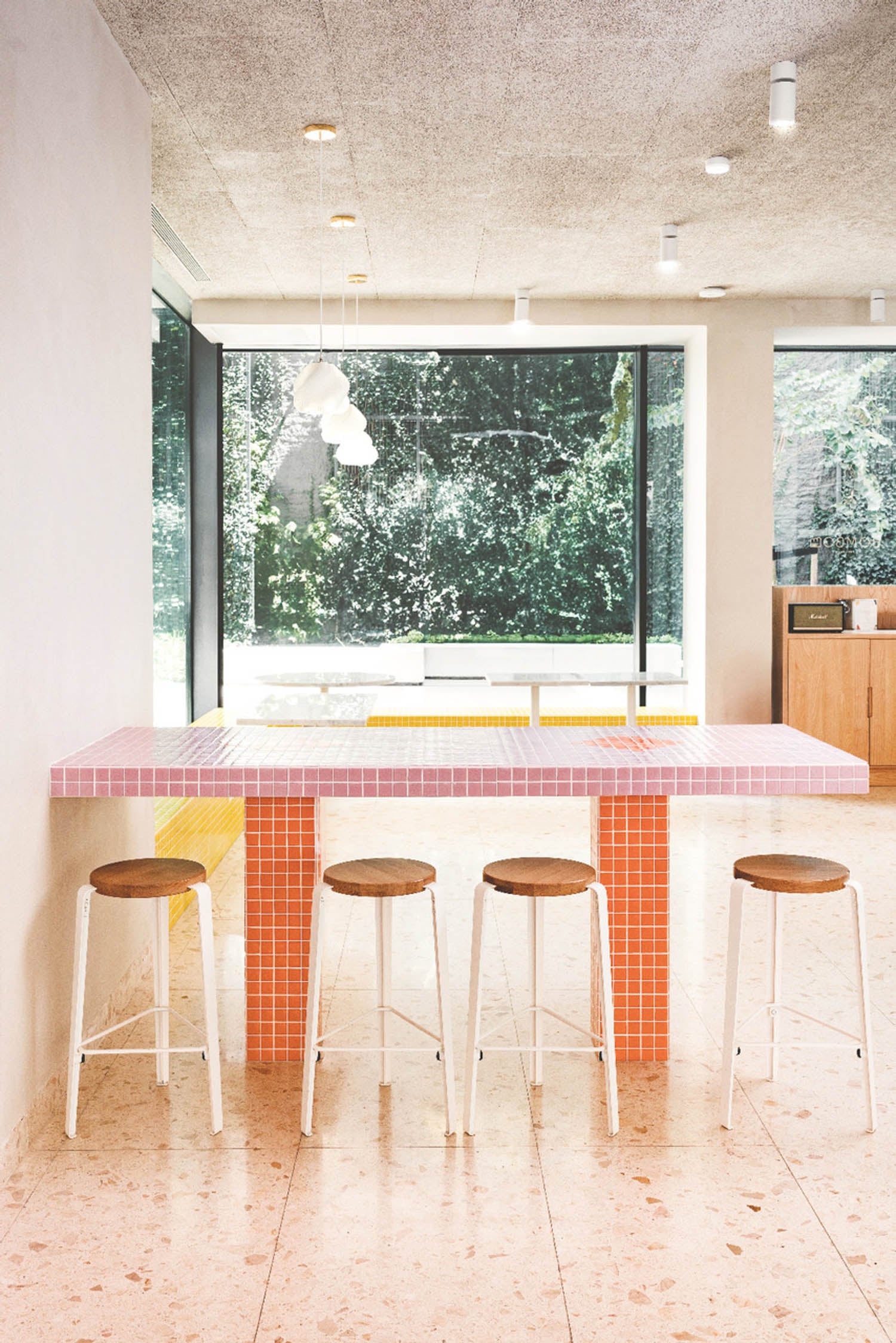 closeup of pink tables in the cafe