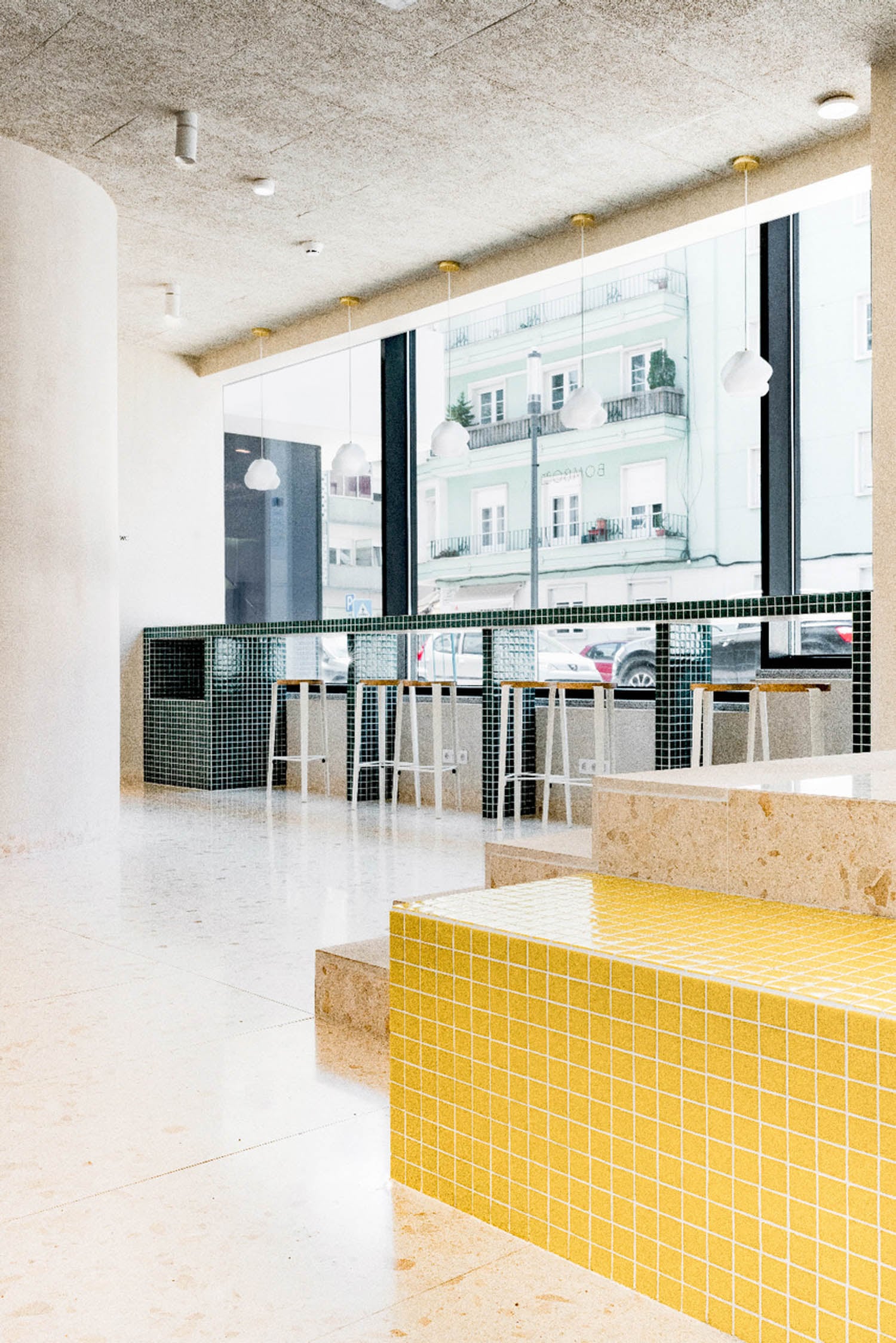 view of counter tables separated by tile sections