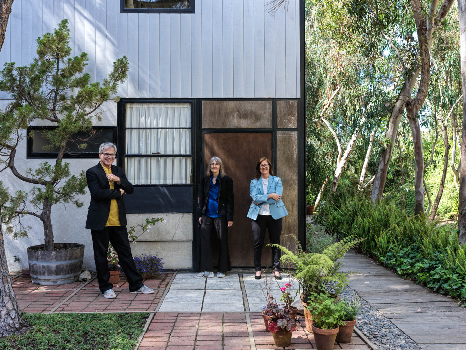 people standing outside the studio