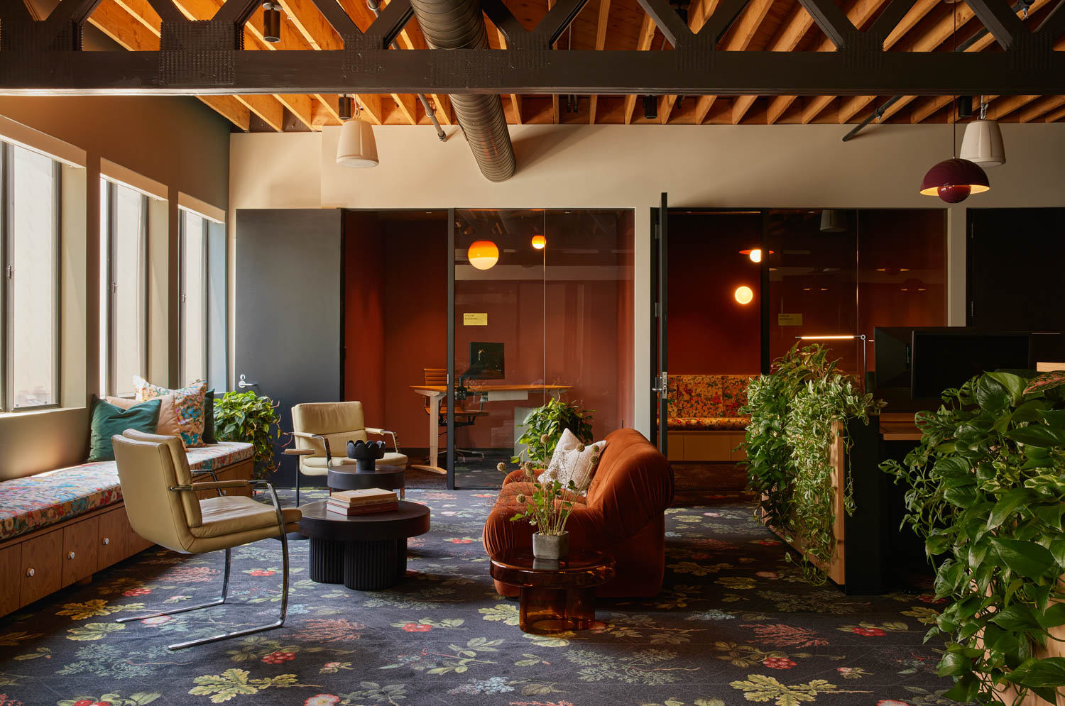 lounge area with botanical flooring and shrubbery