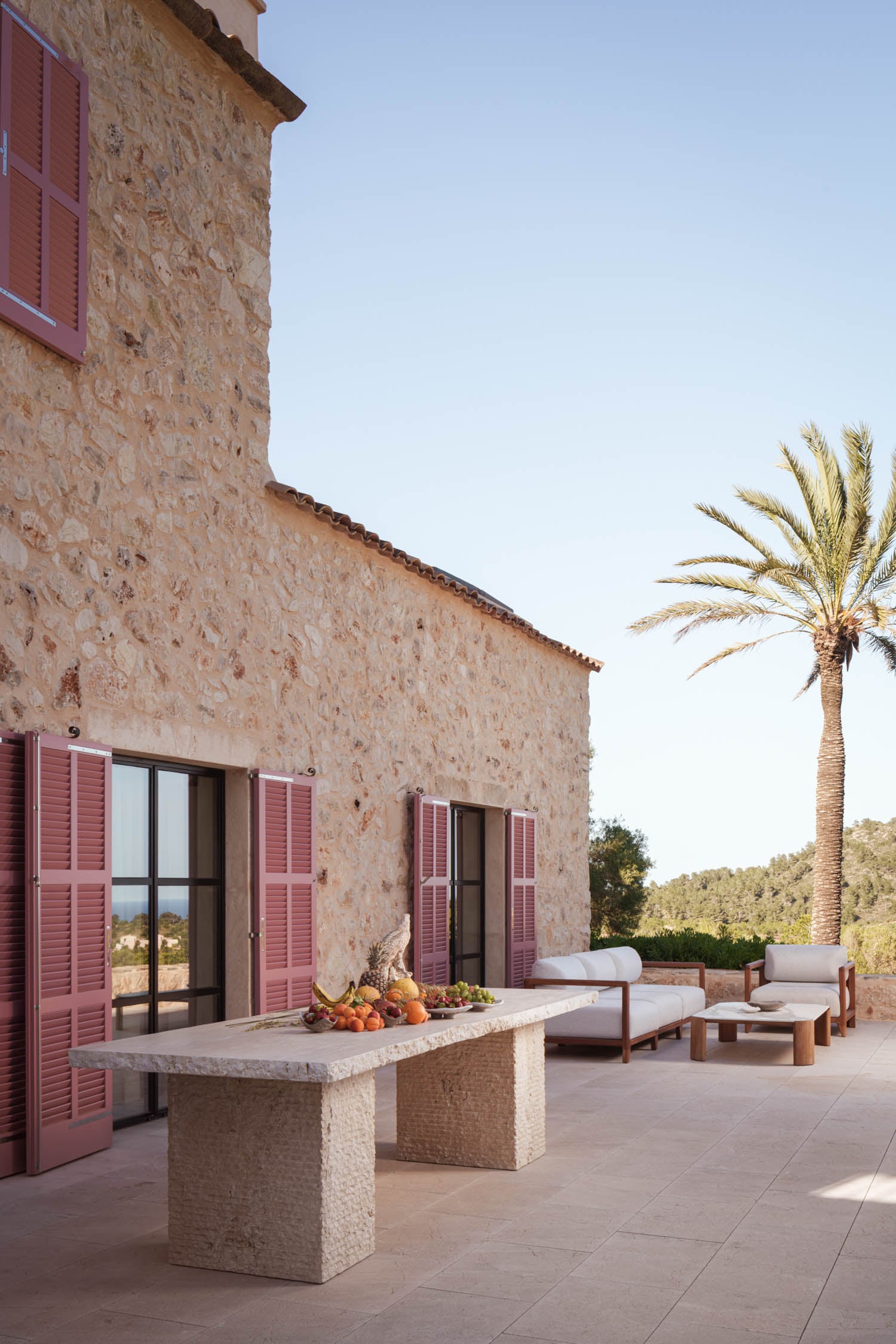 exterior stone facade with pink windows