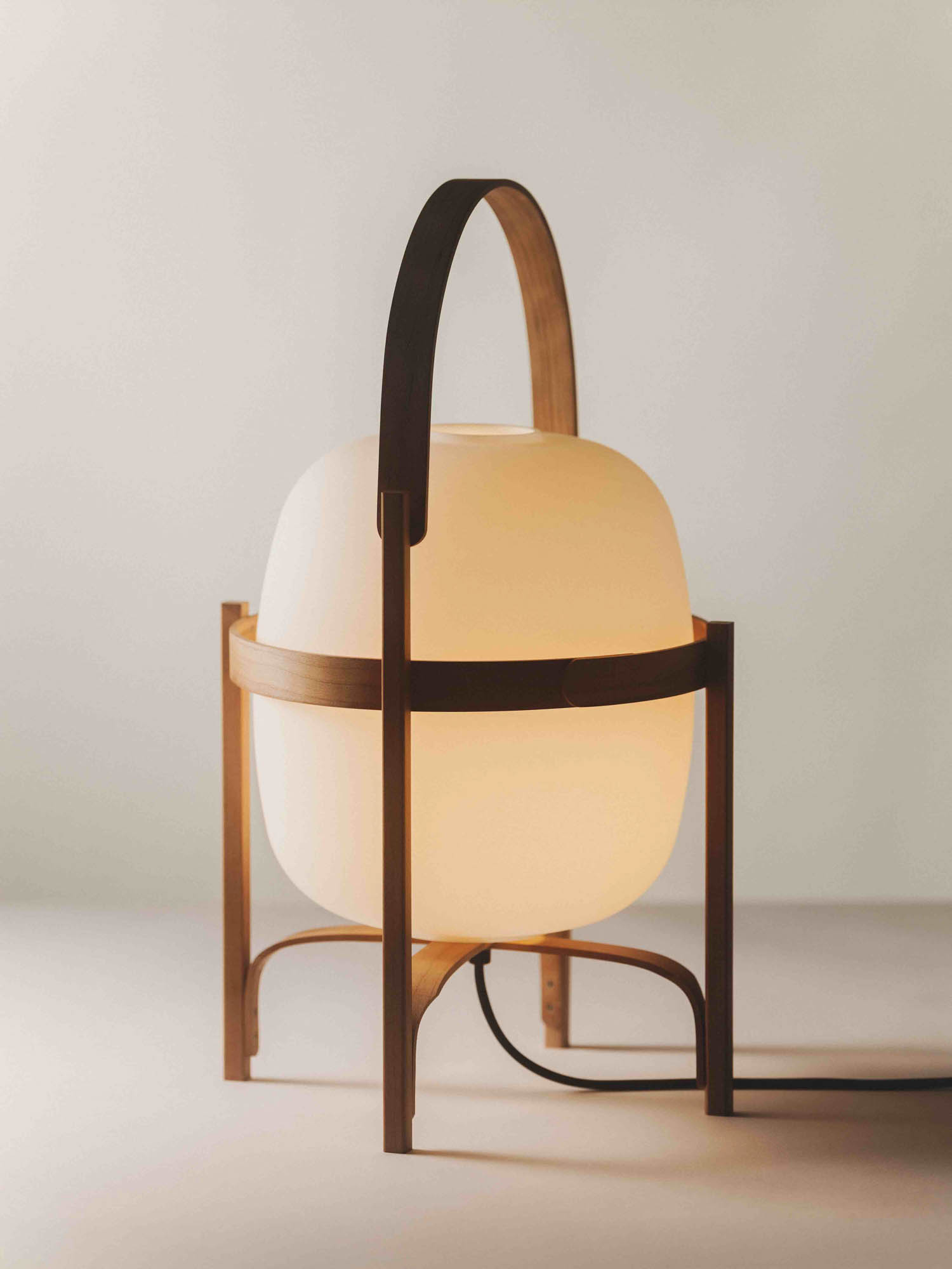 round orb lamp with bronze decorations