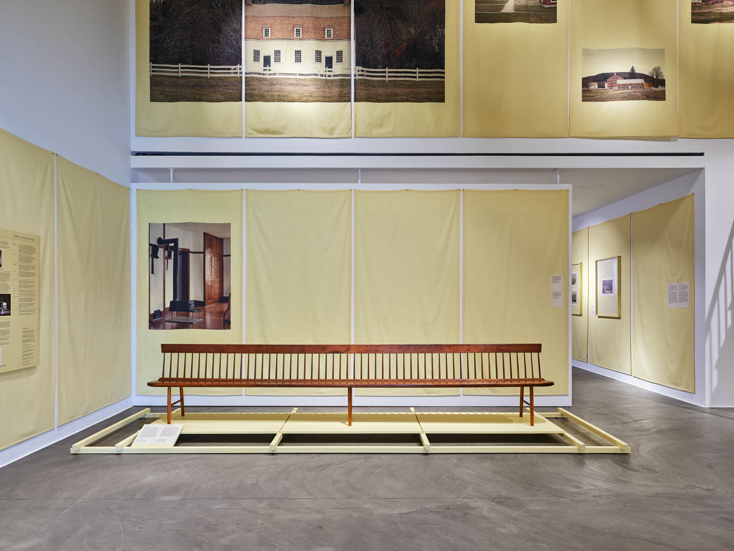 yellow room with long bench displayed