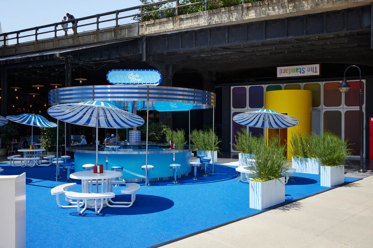 seating area with lots of umbrellas