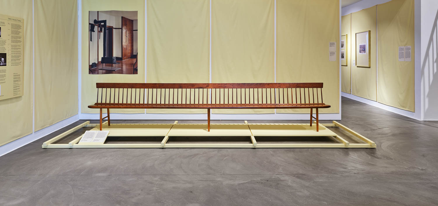 yellow room with a bench