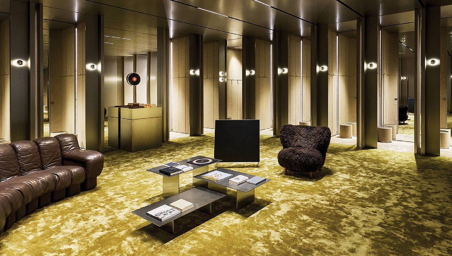 A brown leather couch in ZARA