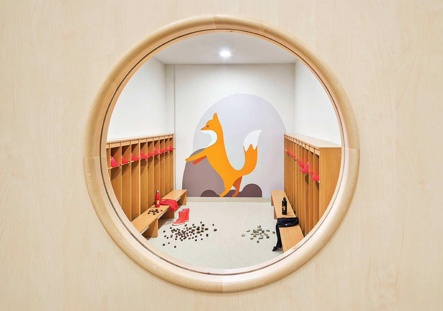 A mirror with a picture of a fox in it