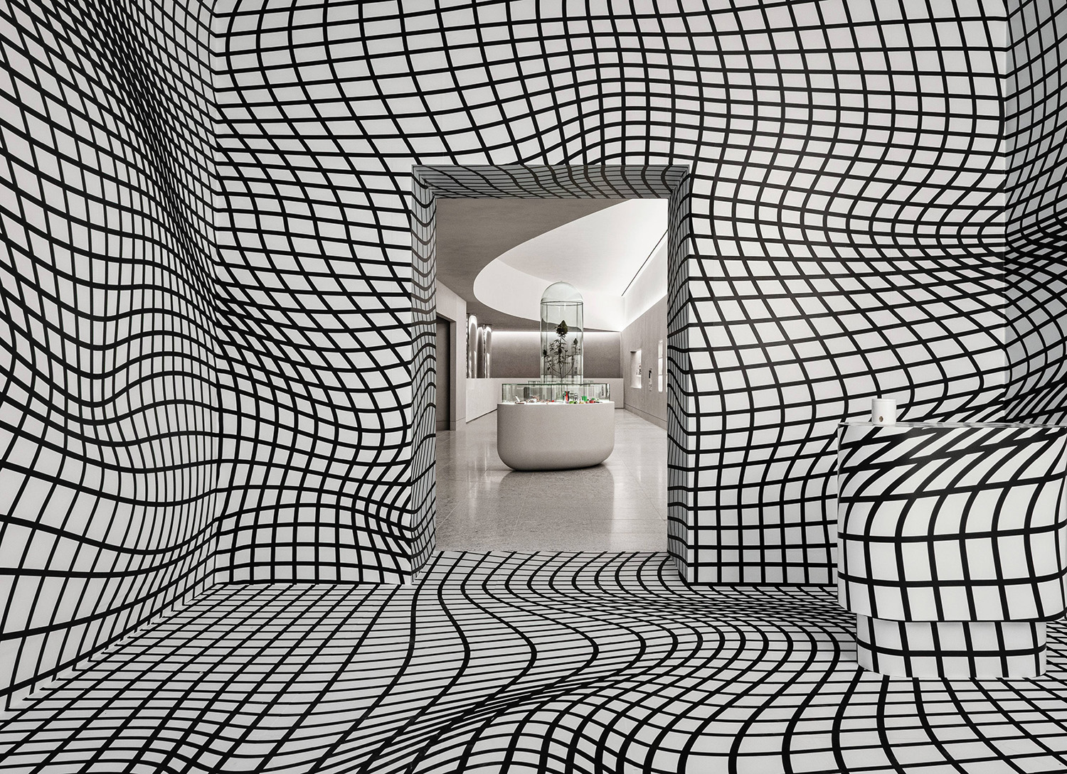 A black and white room with a large window