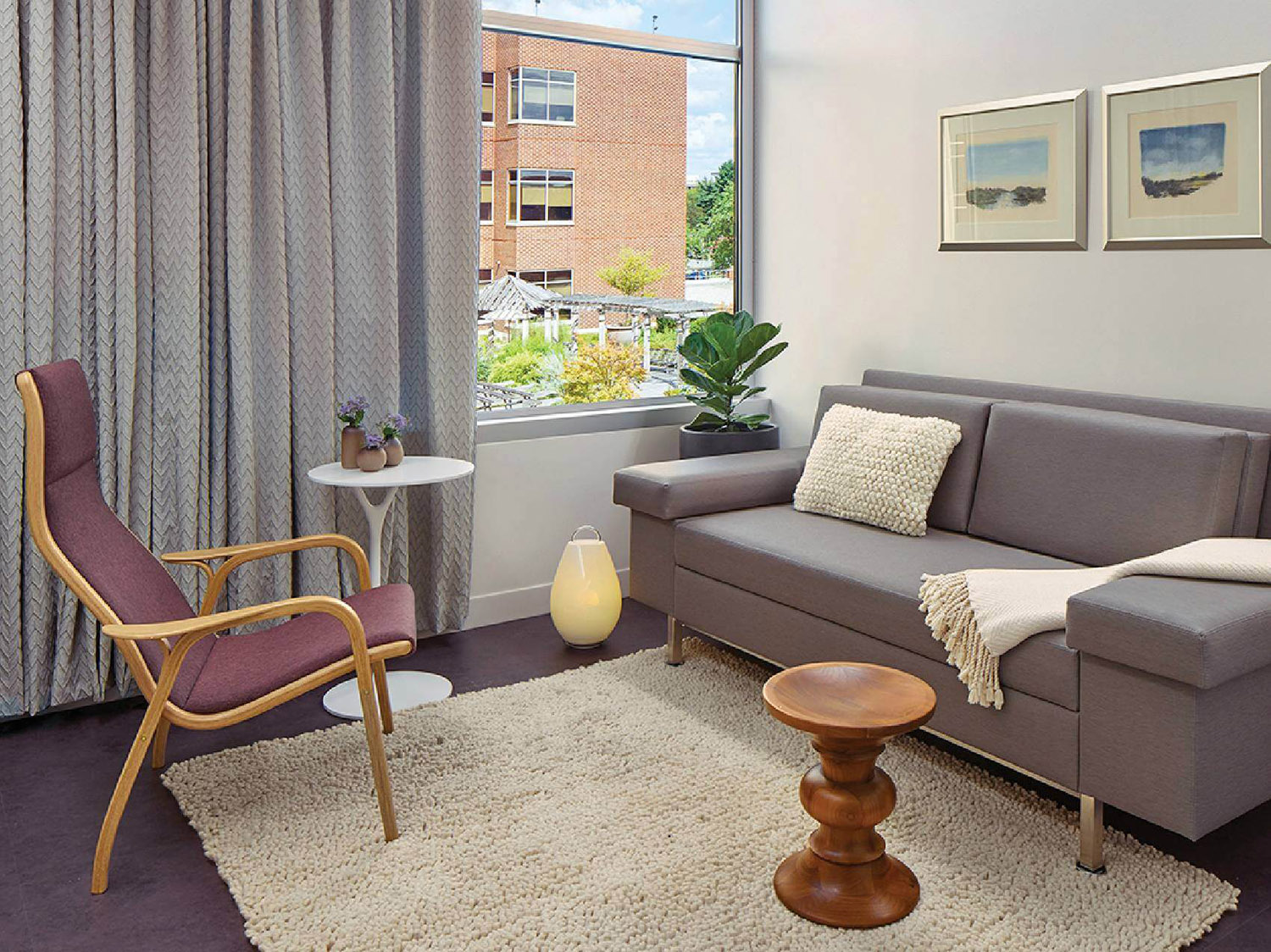 A living room with a couch and a chair