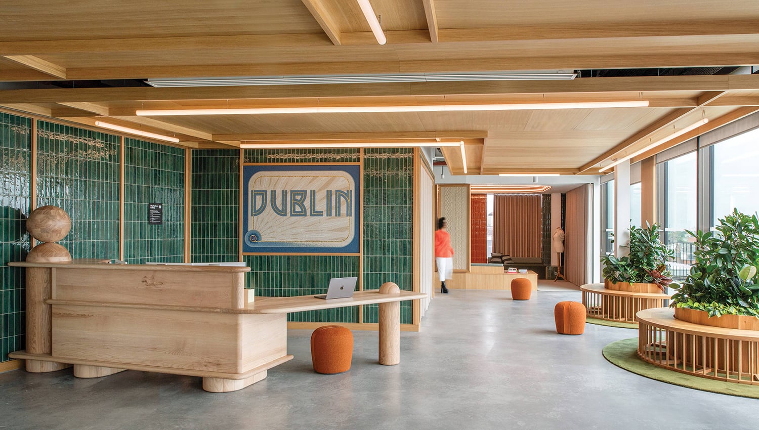 A room with a desk and a large window.