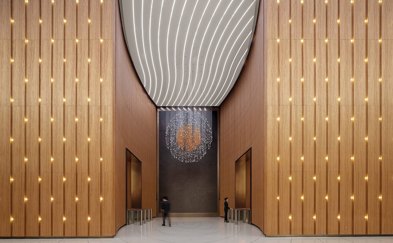 A large wooden building with a long ceiling.