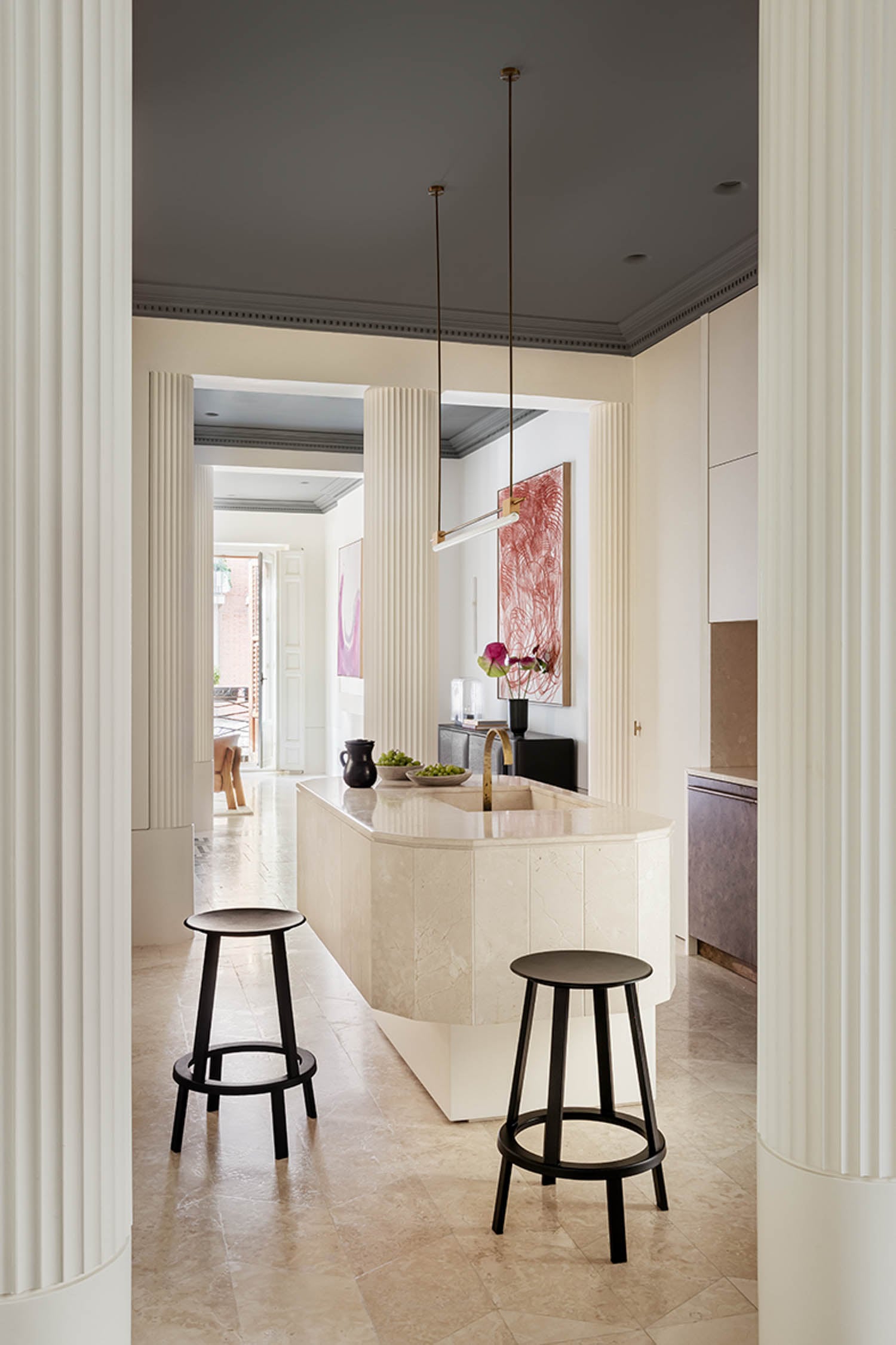 kitchen with bar stools and white kitchen island