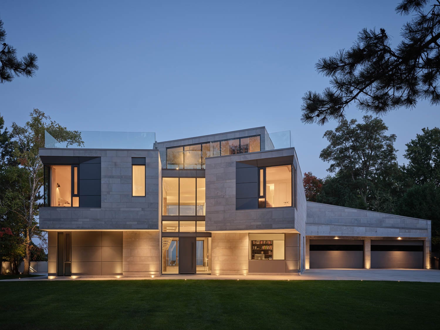 exterior of house lit up at night
