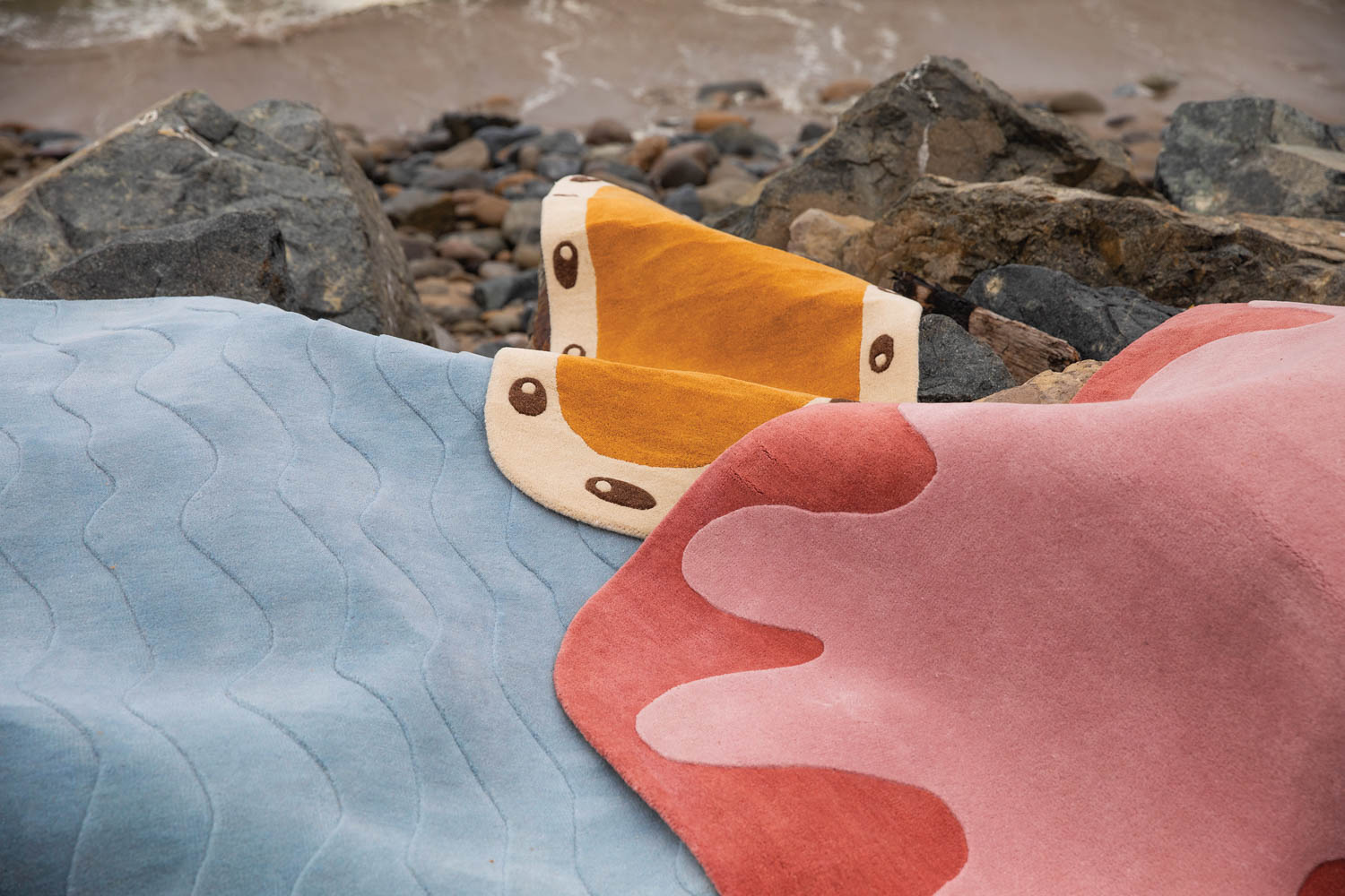 multiple rugs on the ocean