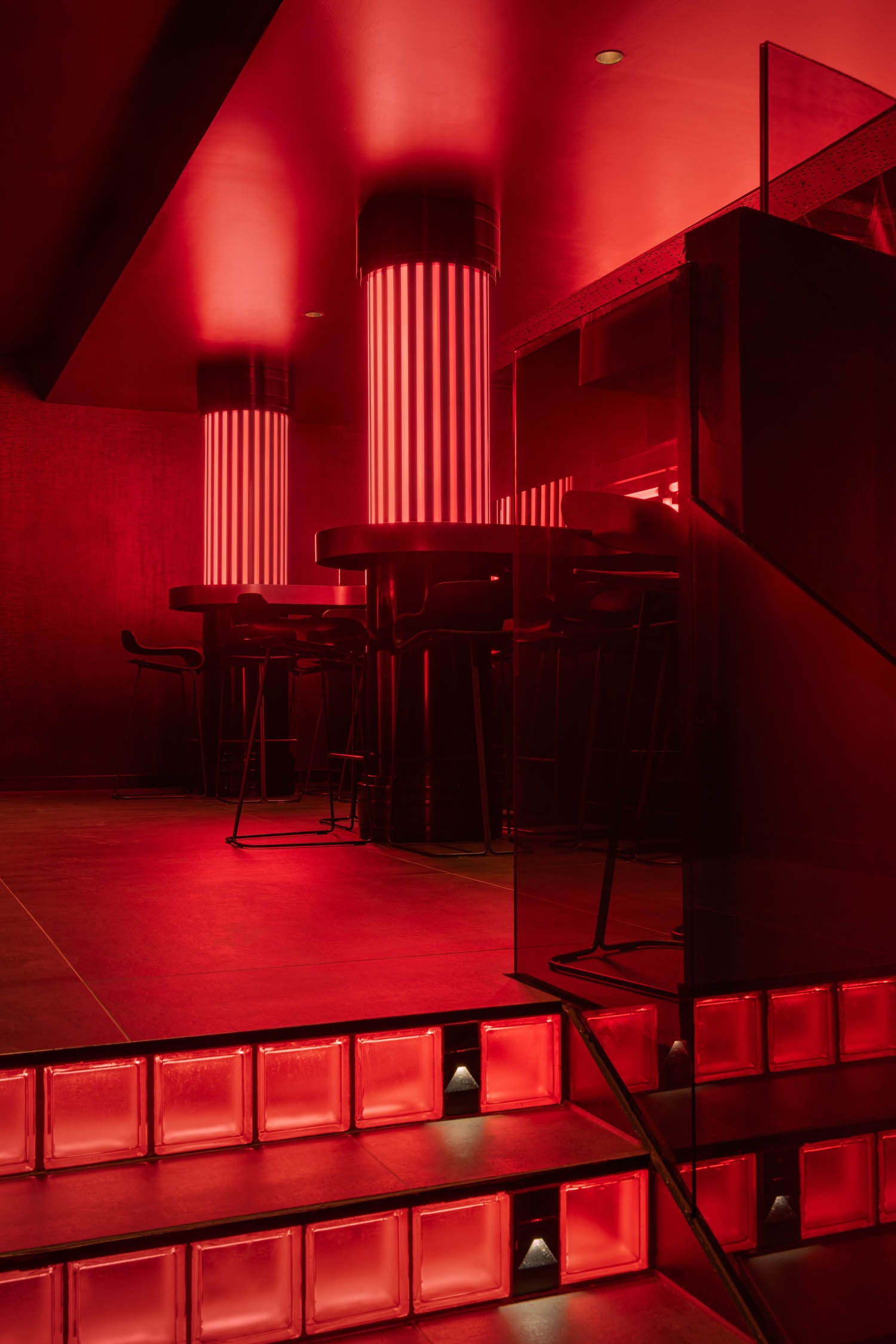 upper level with red lights, flooring and ambience