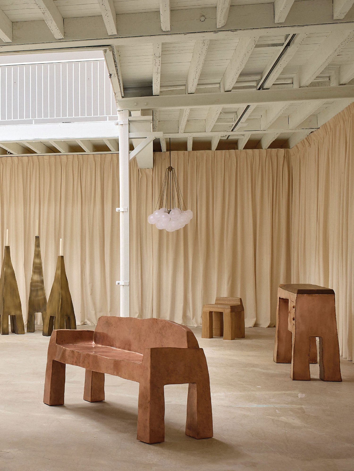 A room with a table and chairs in it