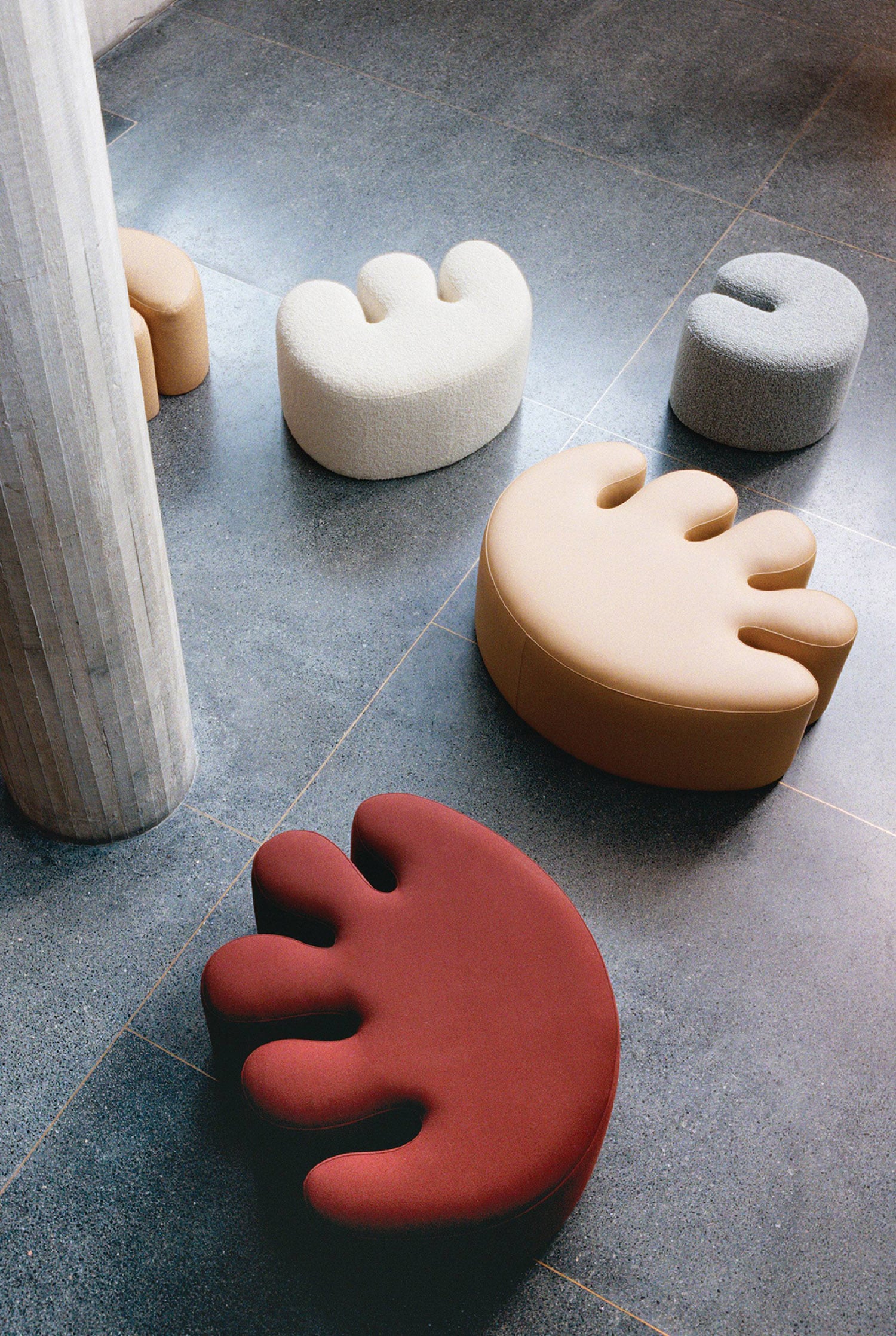 A red chair and a white chair and a white chair.