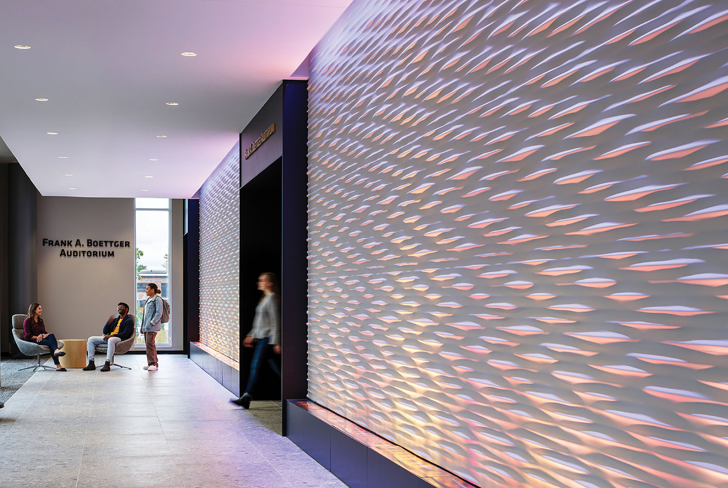 A wall with a pattern of light coming from it