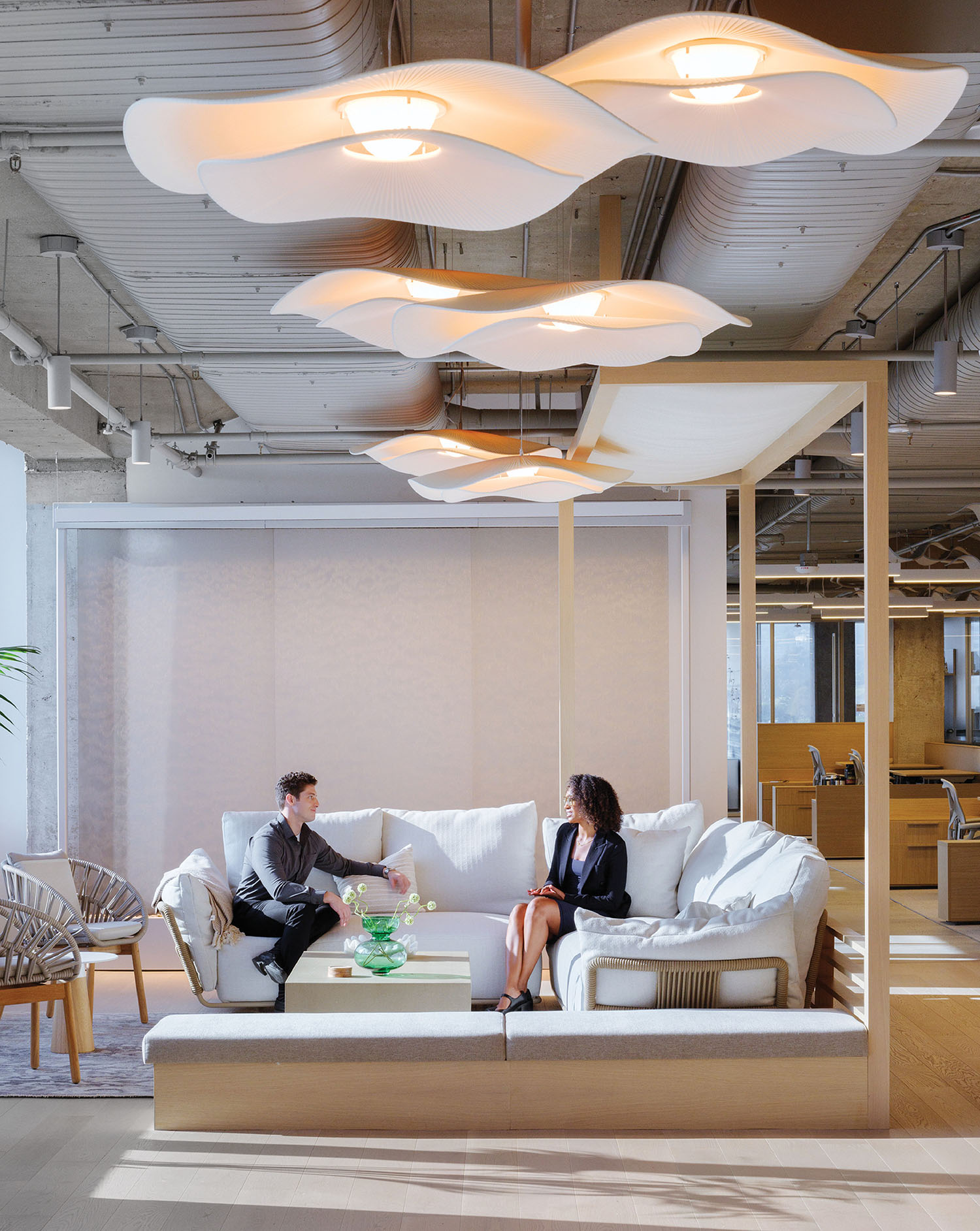A couple sitting on a couch in a room