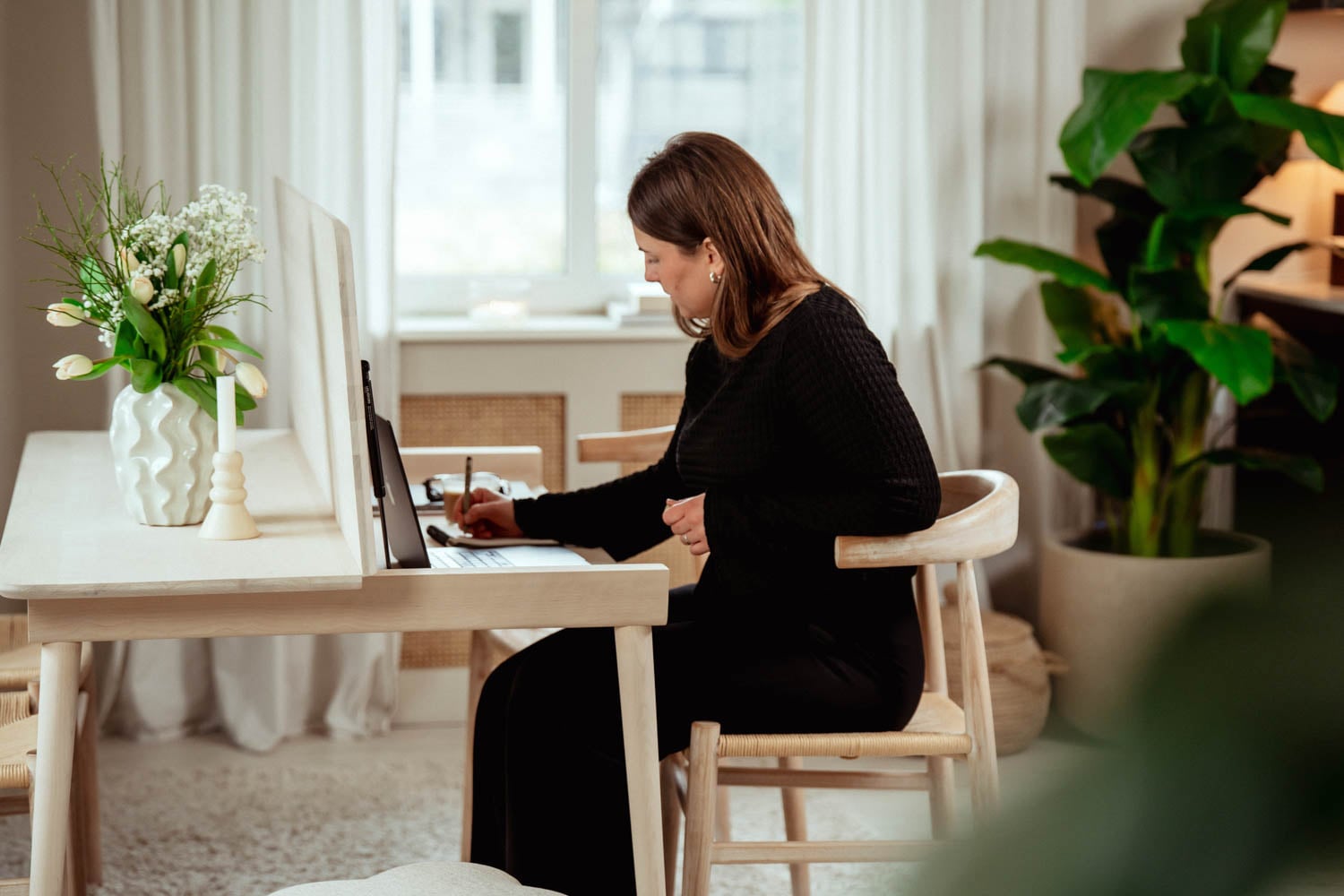 woman sitting at desk