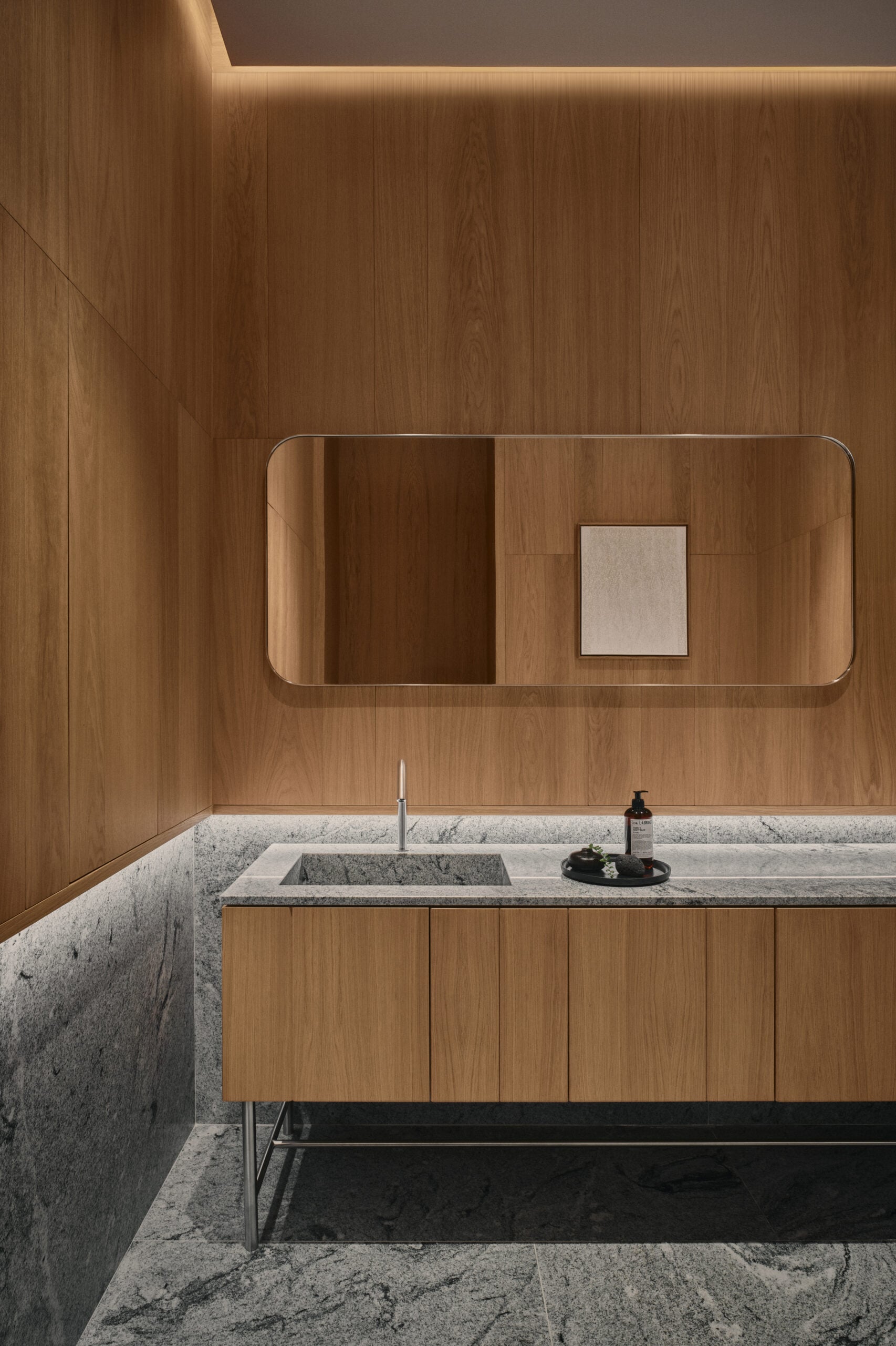 restroom with wooden accents