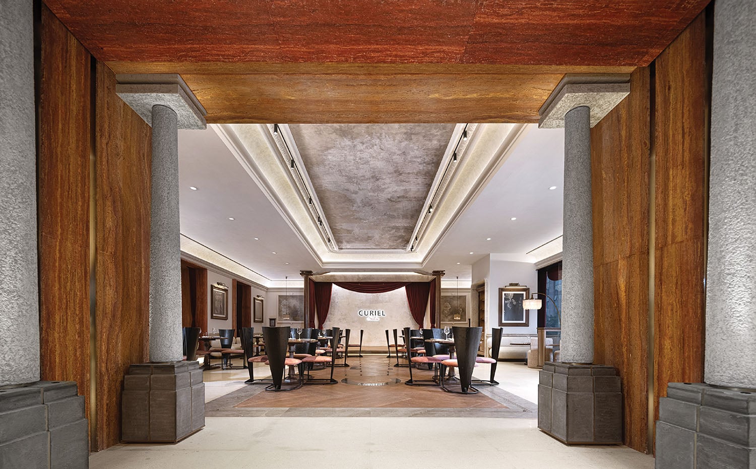 A large room with a large wooden ceiling.