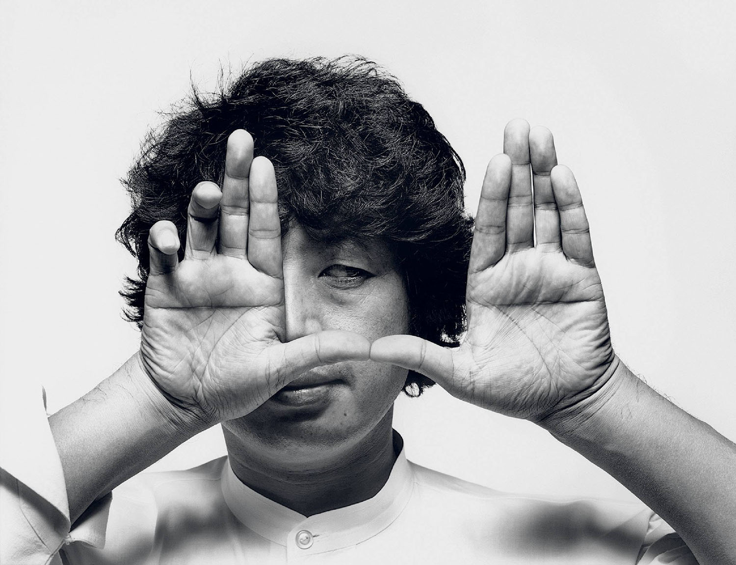 A man with his hands in the air.