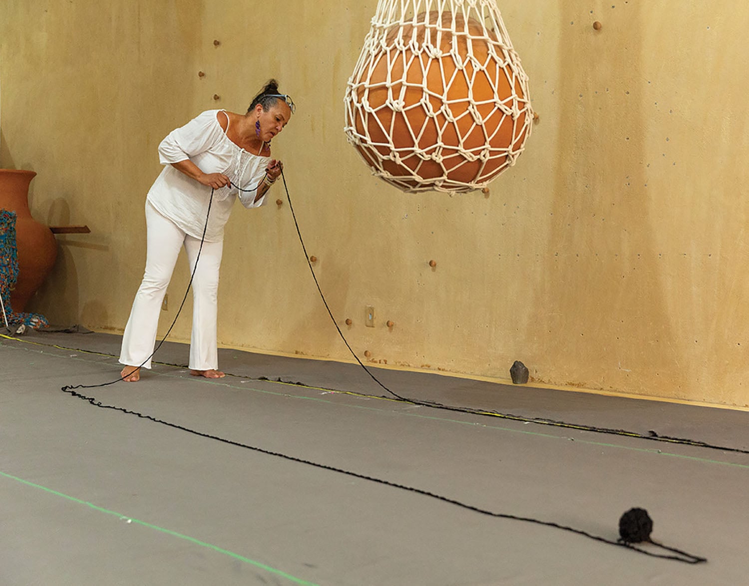 A woman is practicing a yoga pose.